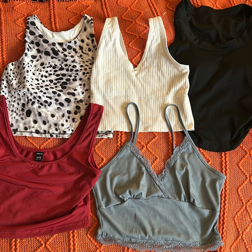 tank tops

five tank tops all being sold together